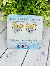 Load image into Gallery viewer, Darling Cubic Zirconia Bow Dangles
